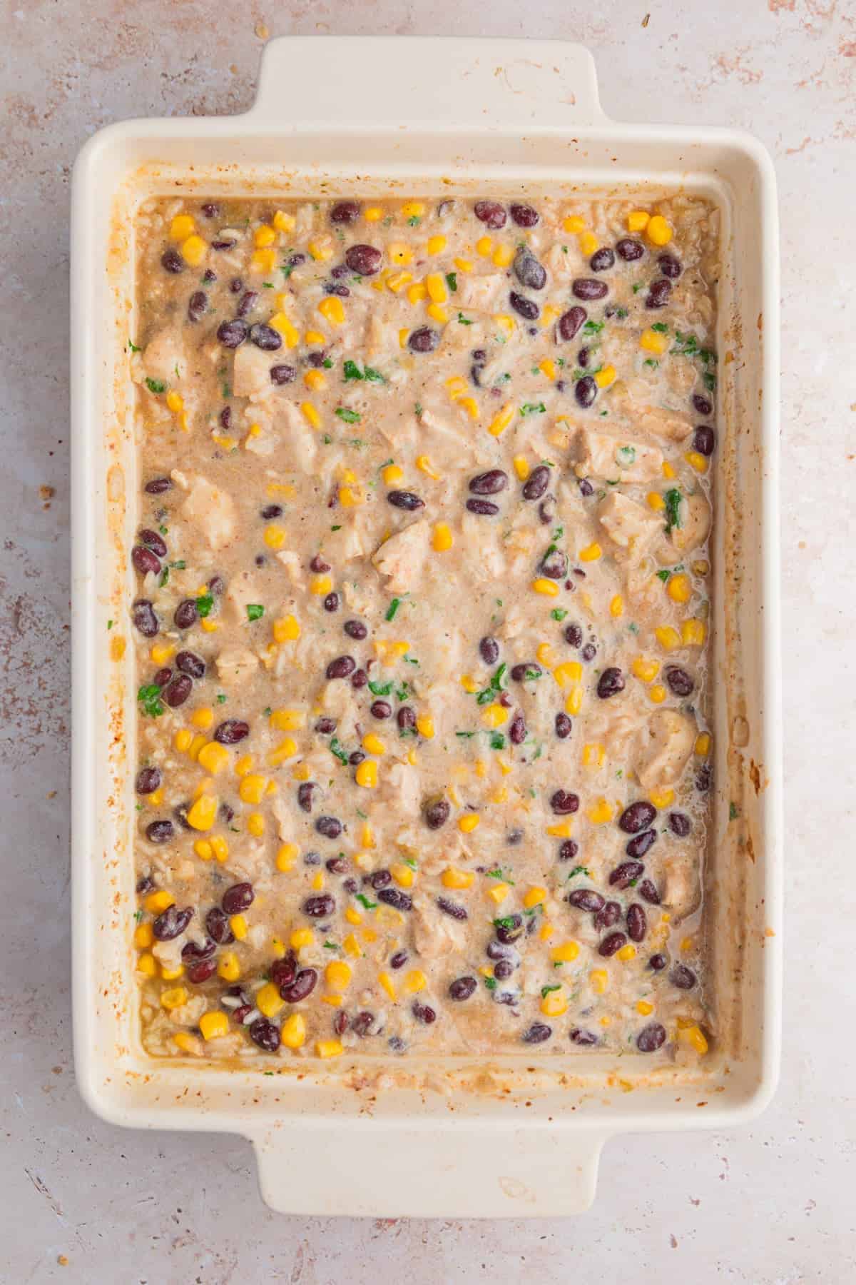 Sour cream and cilantro added to chicken and rice bake.