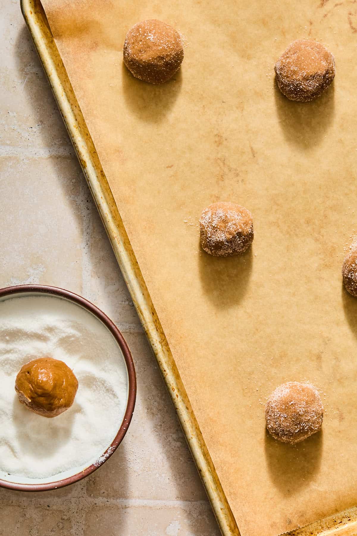 Rolled cookie dough on parchment lined pan.