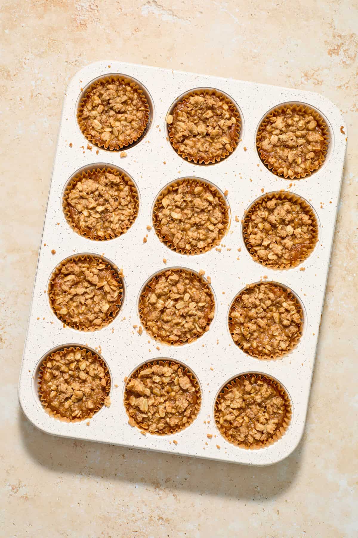 Baked pumpkin crisps in muffin pan.
