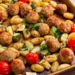 Sheet pan with gnocchi, meatballs and vegetables.