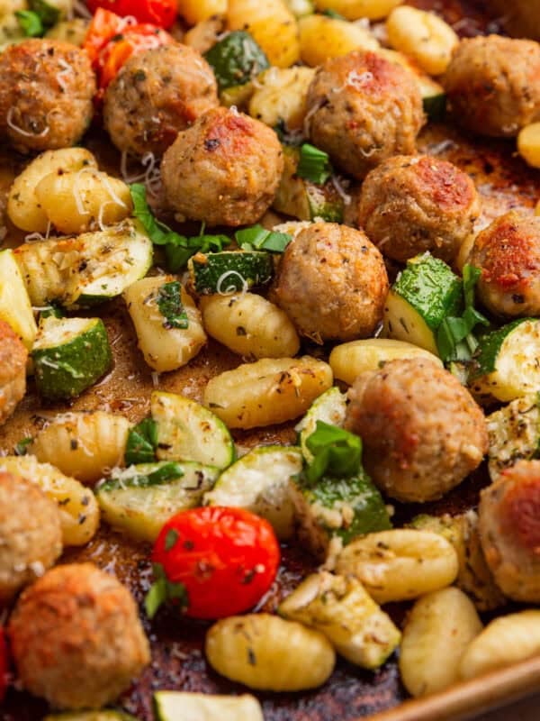 Sheet pan with gnocchi, meatballs and vegetables.